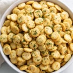 A white bowl filled with Ranch Oyster Crackers.